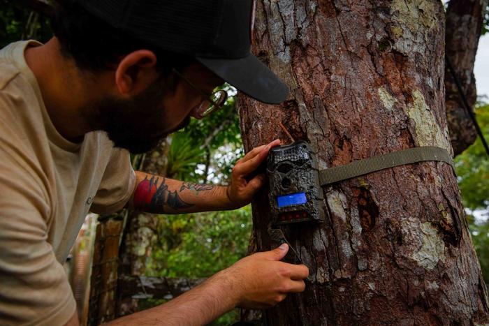 Justin Santiago installing camera