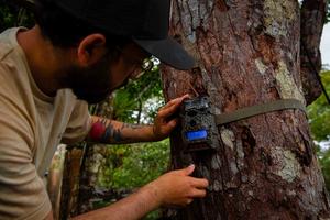Justin Santiago installing camera