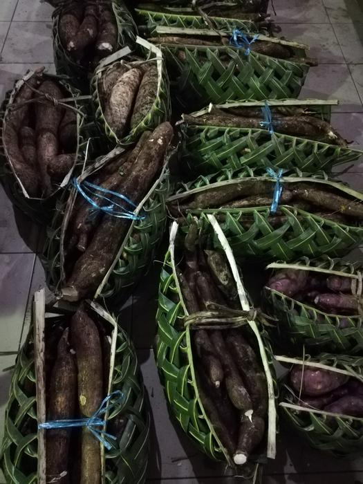 Yams in baskets for sale at the Port Vila markets, Vanuatu
