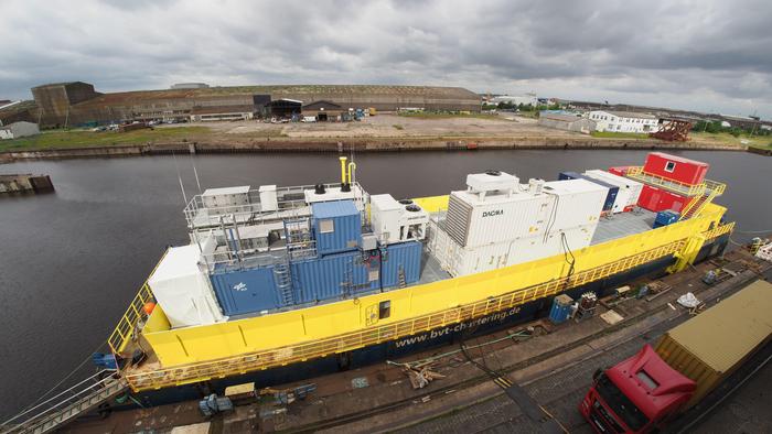 Floating platform with modular container facility for the offshore production of synthetic fuels from wind energy, seawater, and ambient air. (Photo: DLR)