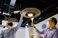 Demonstrating the dual airflow generated by the Vortec fan