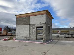 Initial construction of the building with its reusable brick walls.