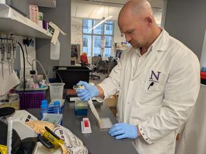 Study author Dr. Adam Williams conducting allergy research