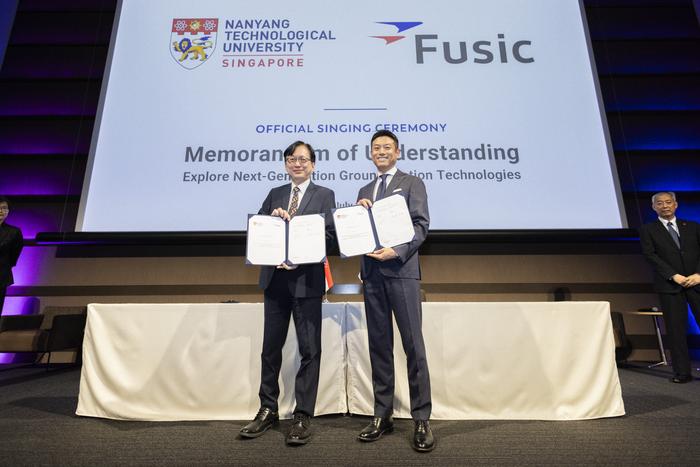 Mr Lim Wee Seng (left), Executive Director, NTU Satellite Research Centre; with Mr Sadayoshi Noutomi, President and CEO of Fusic Co., Ltd.