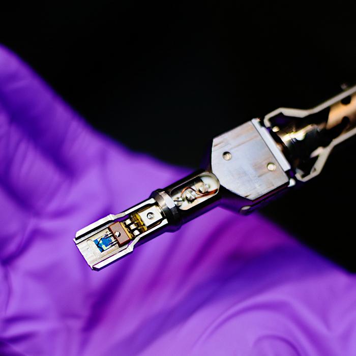 Fig. 1: The Protochips Fusion heating stage and chip used in the Nion electrical module, which enabled the scientists to conduct controlled high-temperature studies in the vacuum of the microscope.