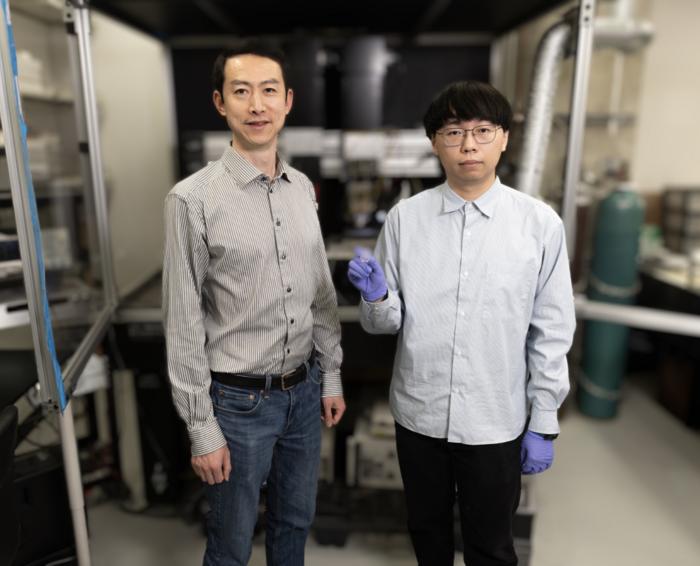 Zhang with student