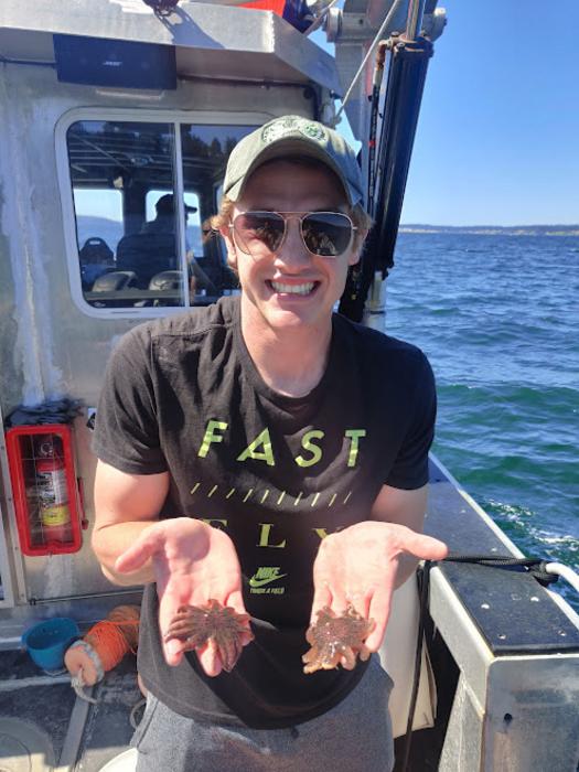 Andrew McCracken with sea stars