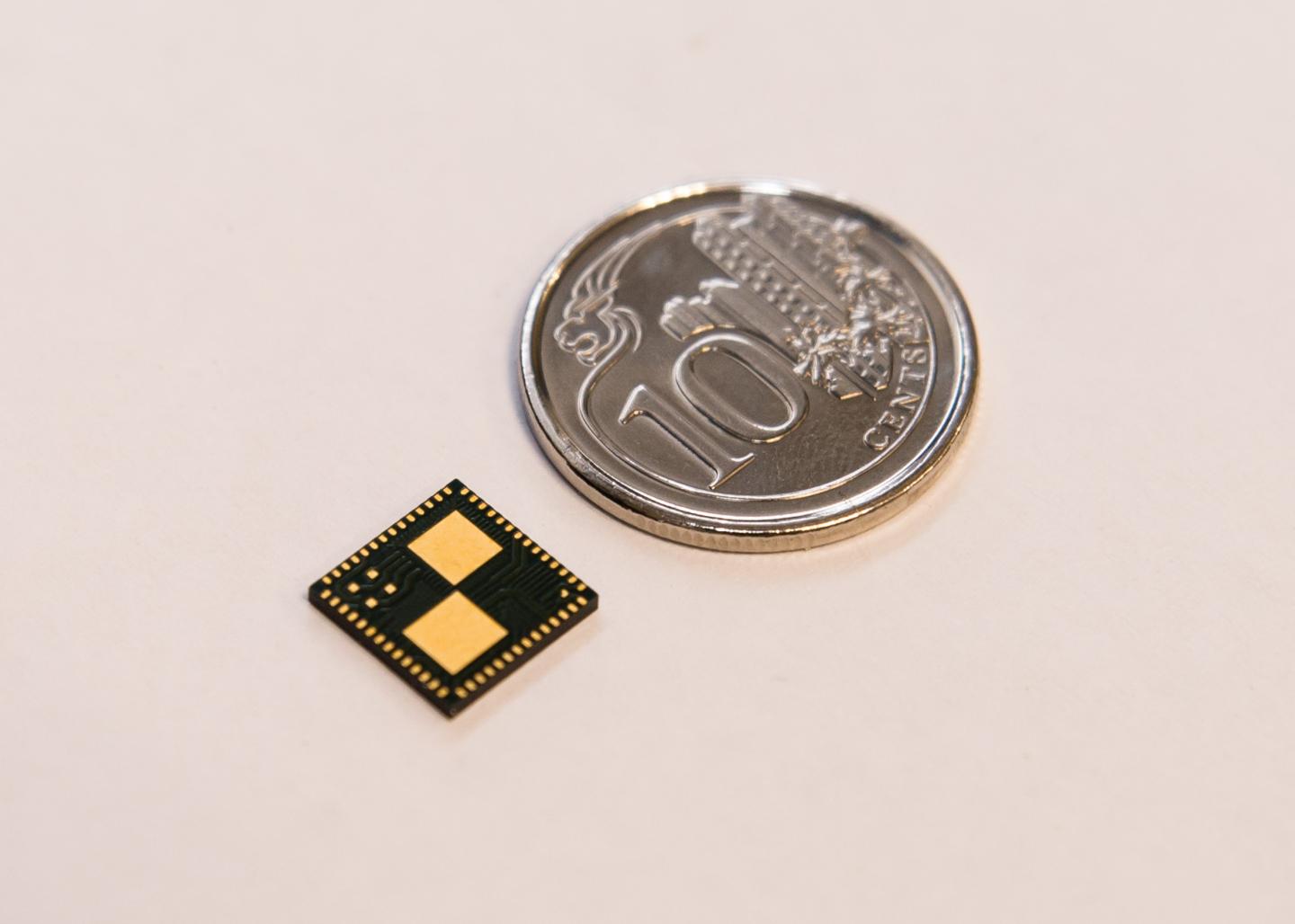 Smart Battery Chip Placed beside a Singapore 10 Cent Coin