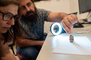 Prof. Natalie Munro and Dr. Laurent Davin with the figurine
