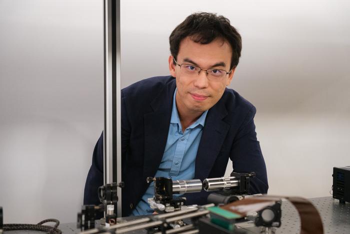 NTU Assistant Professor Shen Yijie with the experimental setup that used a Poisson spot to generate optical skyrmions