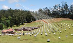 Aerial view of the GRAPES-3 experiment with arrival of a simulated cosmic ray shower