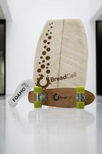 Shoe soles, a bodyboard and a skateboard made with the new foam.
