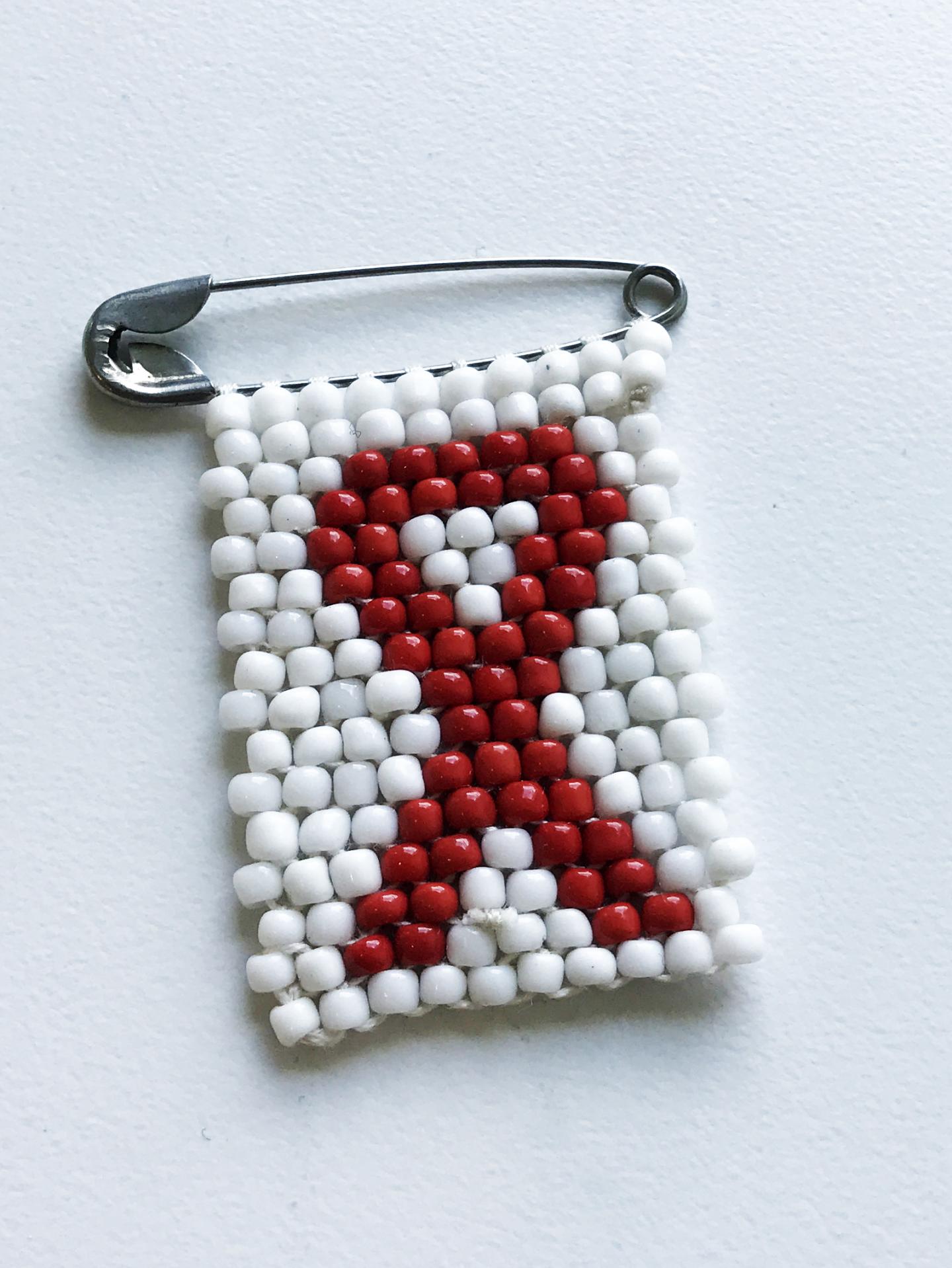 An HIV Awareness Ribbon Pin