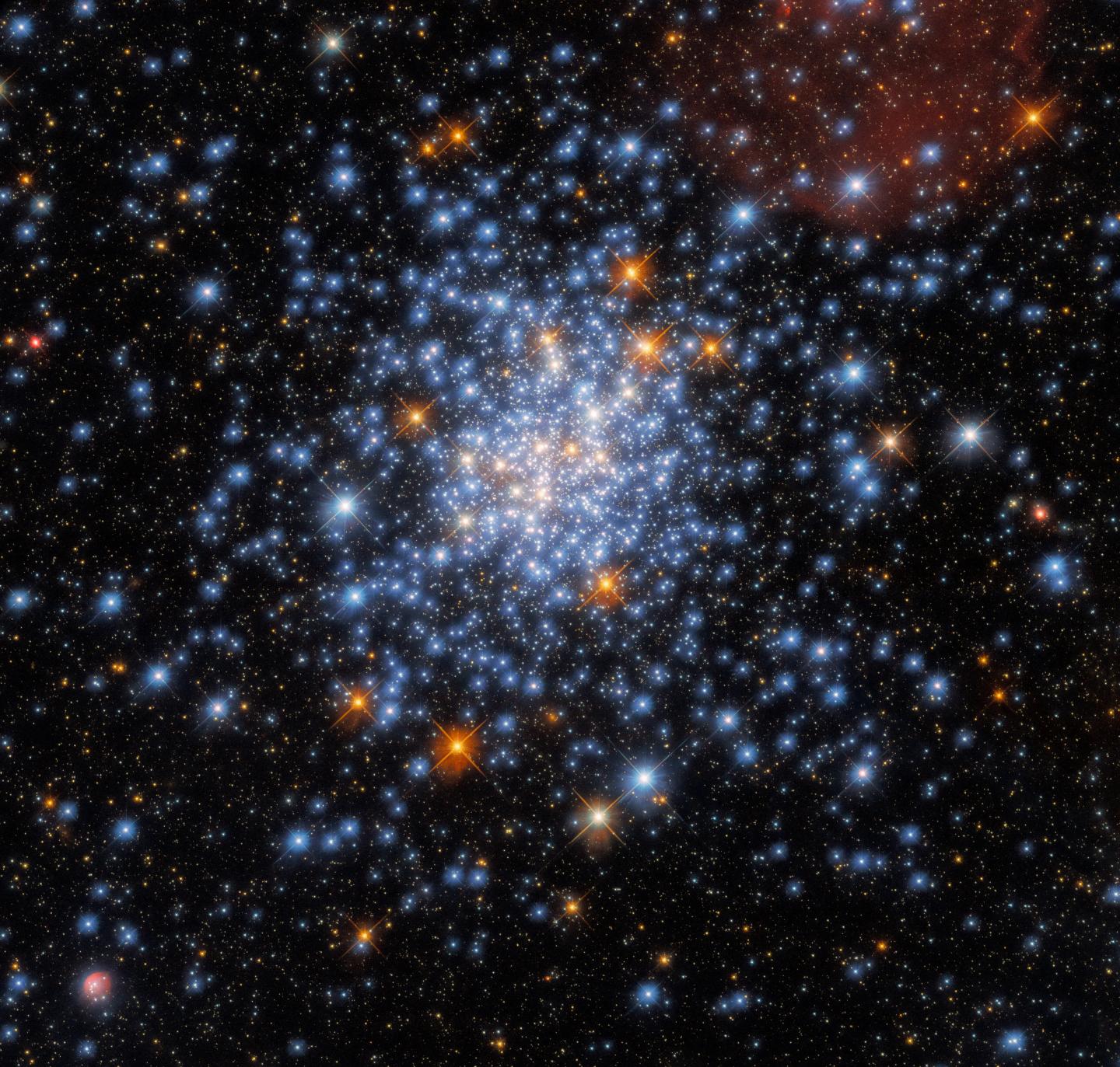 Hubble sees a cluster of red, white, and blue