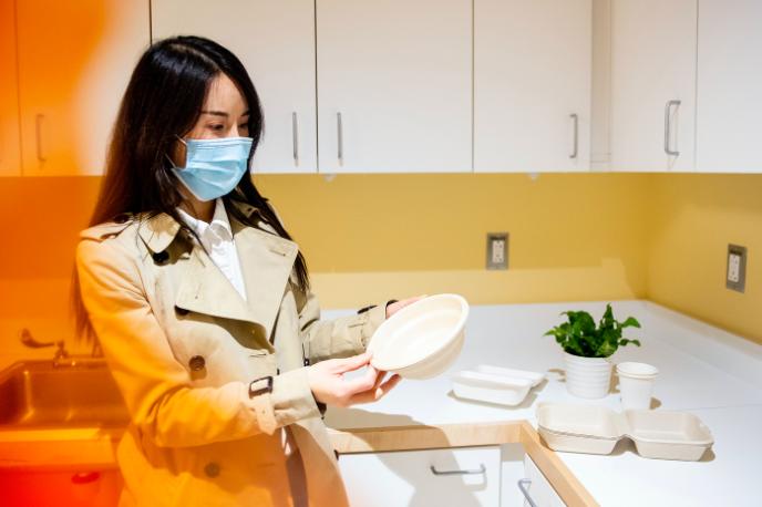 Woman with tableware