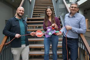 Scientists visualizing the molecular scissor