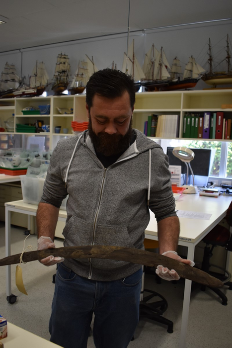 Documenting the boomerangs to conduct radiocarbon dating to determine their ages.