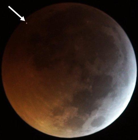 the Flash from the Impact of the Meteorite on the Eclipsed Moon