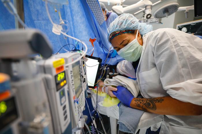 Elizabeth Day, MD, attends to a patient during an awake brain mapping procedure at the University of Rochester’s Strong Memorial Hospital.