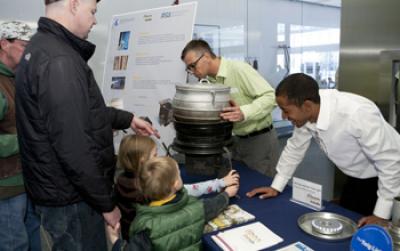 Students Demonstrate Clean-burning Stove and Twig Light