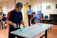 Students from Fernvale Gardens School using the i-Tile for lessons