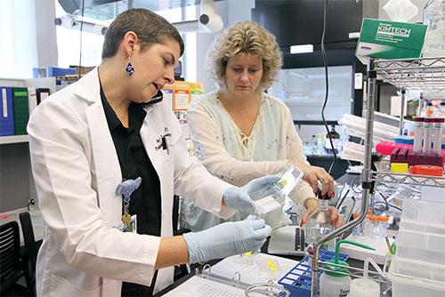 Dr. Ann-Marie Broome (right) and Dr. Amy Lee Bredlau