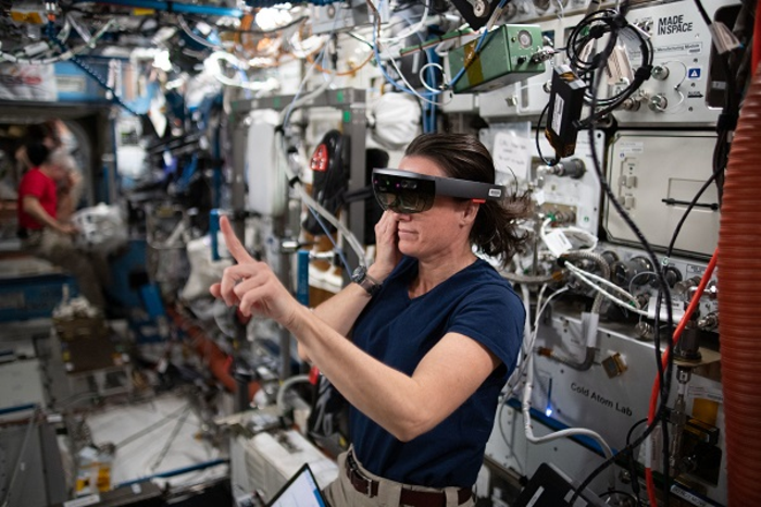 NASA astronaut Megan McArthur wears the HoloLens headset