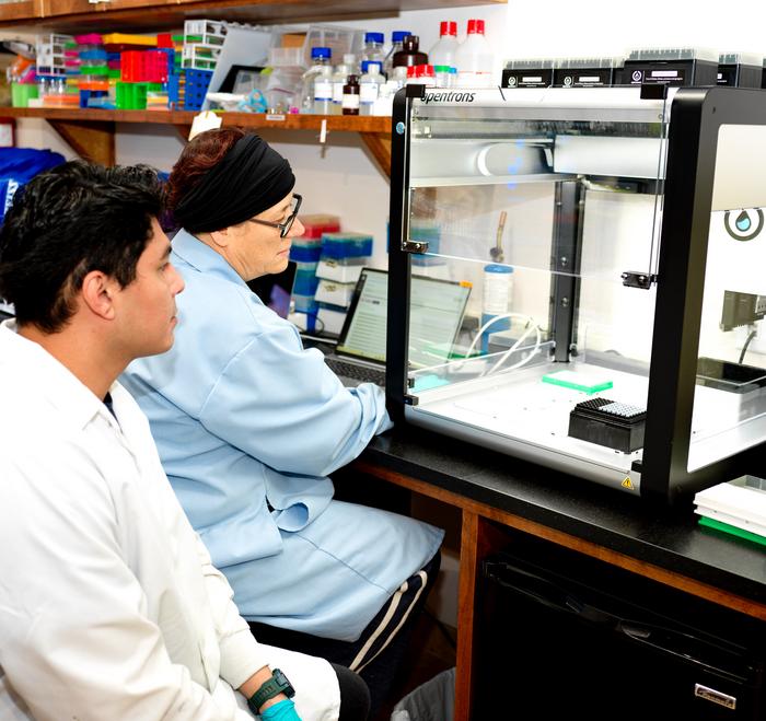 Dunlop, Rachael & Christofer Olan with robot