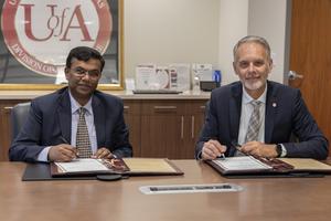Priya Ranjan and Jean-François Meullenet sign agreement