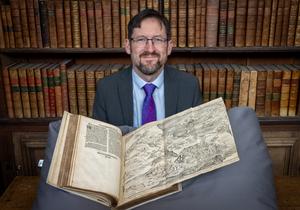 Professor Nathan MacDonald with the Bible map_1