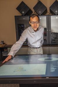 Tian Ma working with remote sensing systems.