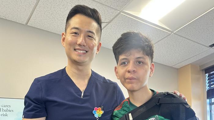 Peter H. Yang, MD, and Camilo Mancera, 15.