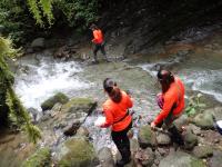 Researchers in Orange Shirts