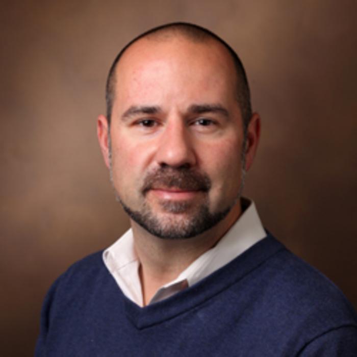 Dr. Justin Balko
