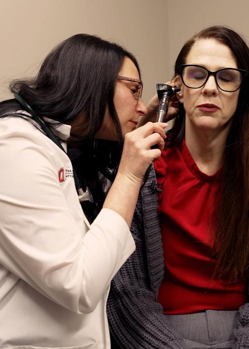 Barbara Bawer, MD, a family medicine physician at The Ohio State University Wexner Medical Center Providing an Exam