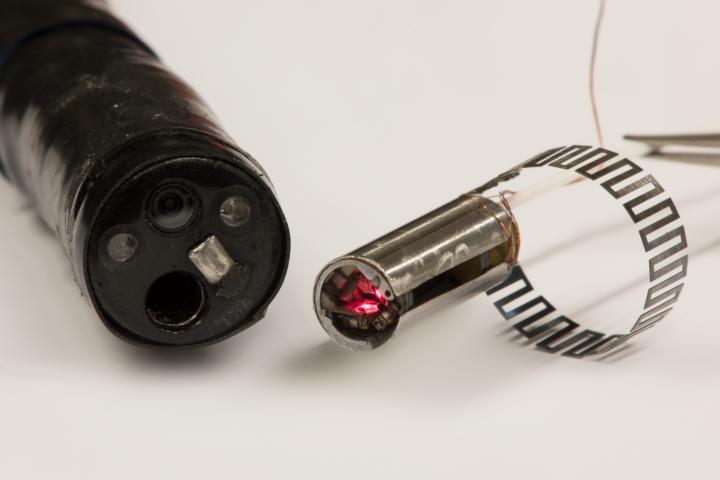 Microrobotic laser-steering end-effector