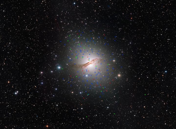 The Giant Elliptical Galaxy Centaurus a (NGC 5128) and Its Strange Globular Clusters