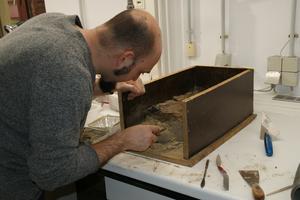 Excavating a sediment block