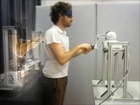 Participant Using Robot (2 of 2)