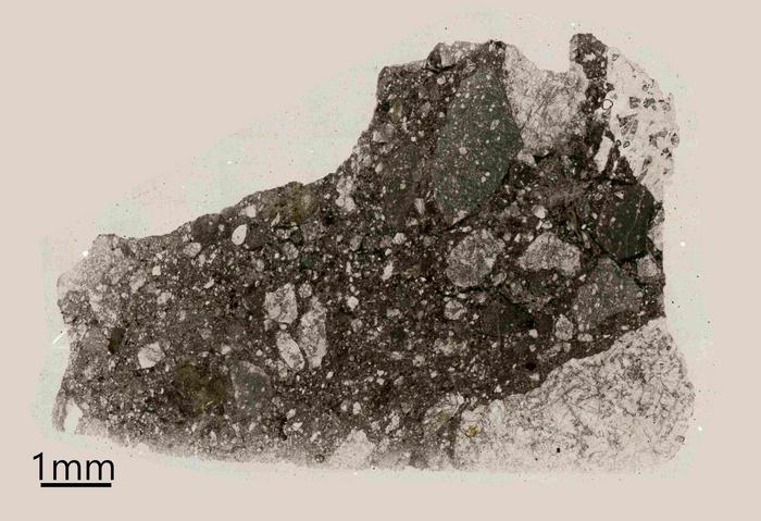 Detection of apatite in ferroan anorthosite indicative of a volatile-rich early lunar crust