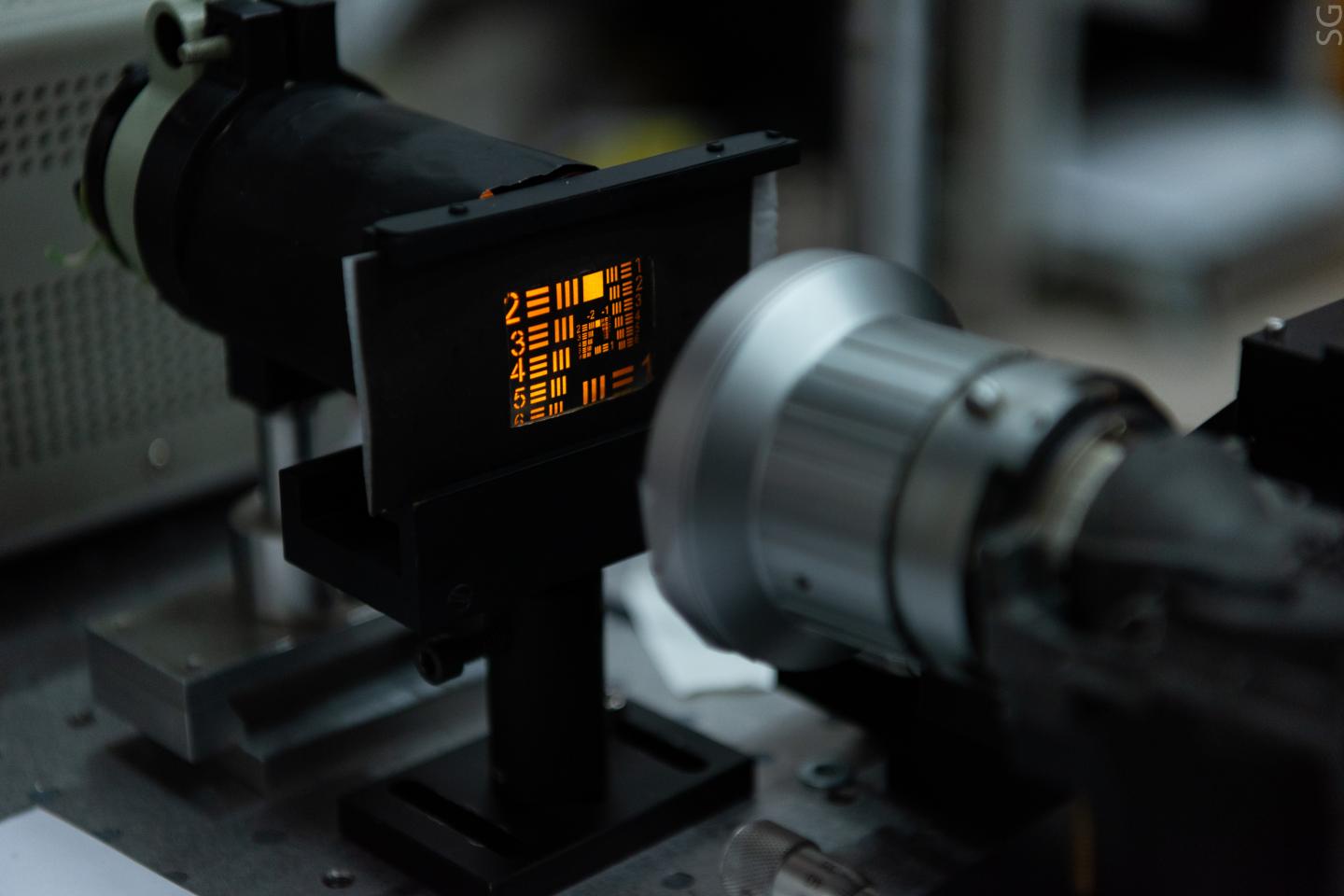 Image of a photon being scaled through special patterns