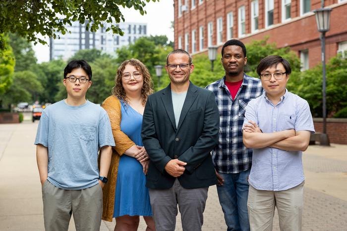 Research team outside on Urbana-Champaign campus