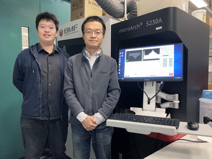 Prof. Hu Wenqi (right), his postgraduate student Chen Xi (left) and other research team members in HKUST develop the world's first bio-inspired artificial cilia system, which advances breakthroughs in medical and microrobotics applications