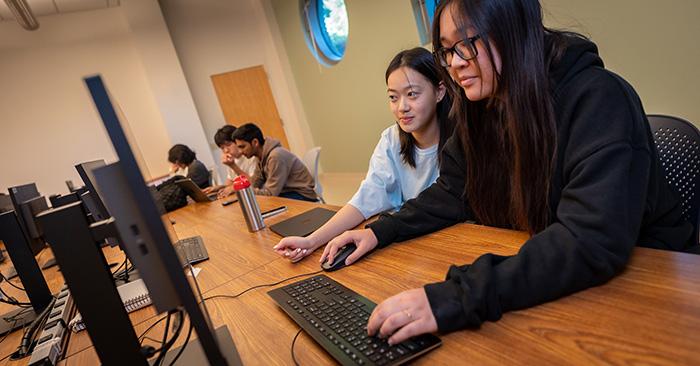 Picture of two students using the AI tutor