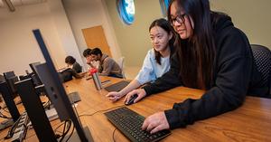 Picture of two students using the AI tutor