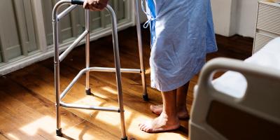 Elderly person using a walking frame