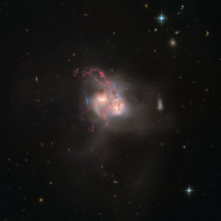 An Ongoing Cosmic Collision