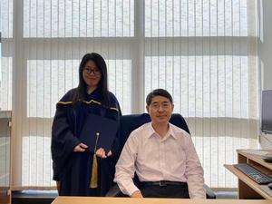 Prof. Qian Peiyuan (right) and Dr. Lan Yi.