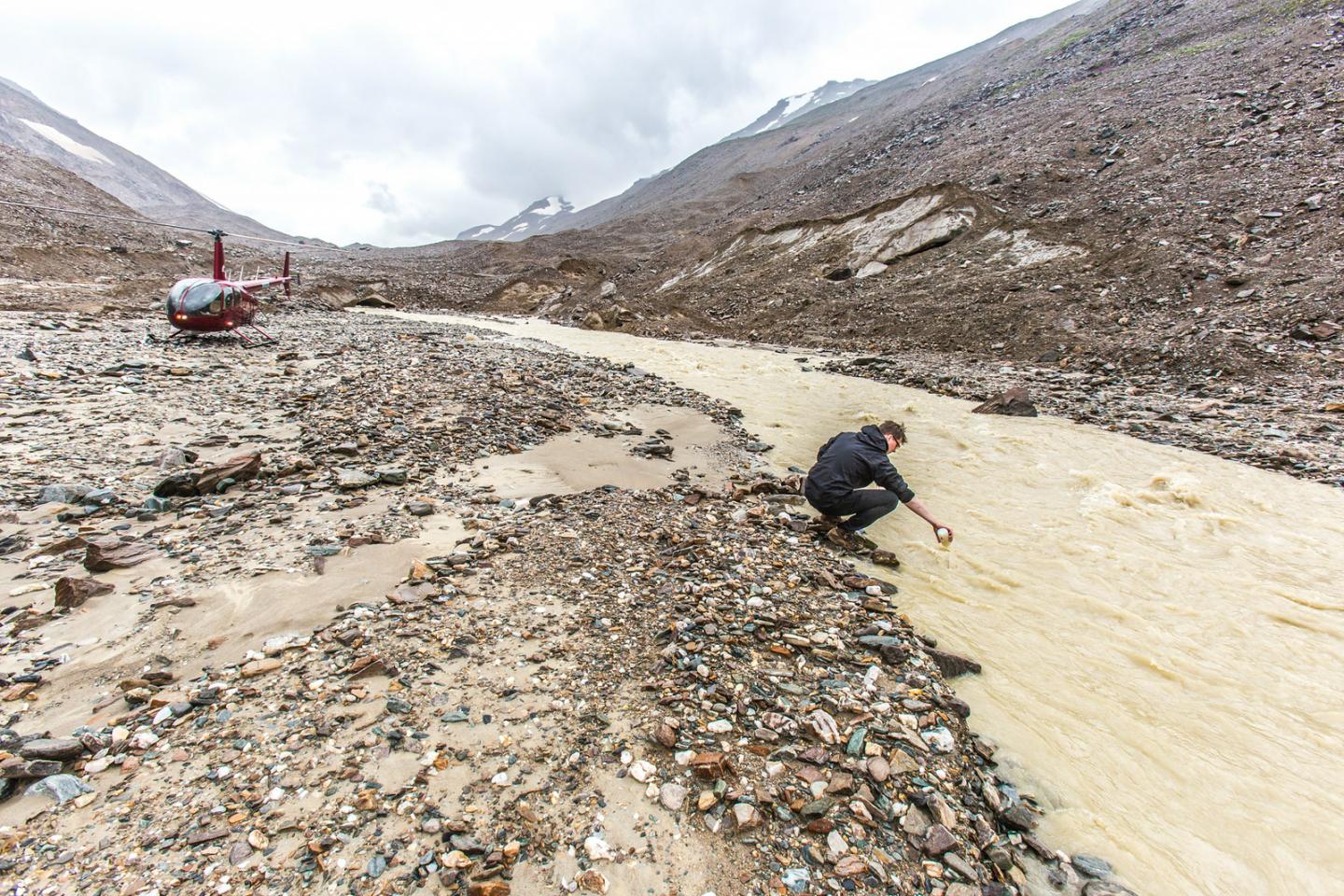 Taking a Water Sample for Geochemical Analysis
