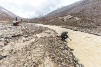 Taking a Water Sample for Geochemical Analysis